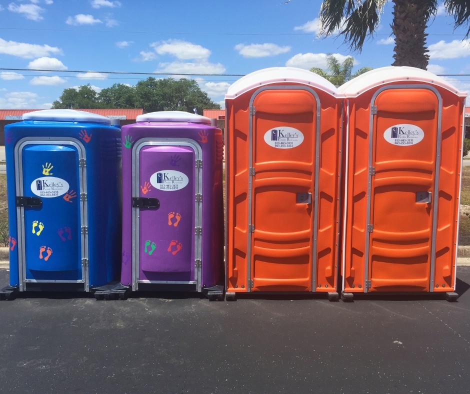 a row of portable toilets sitting next to each other.